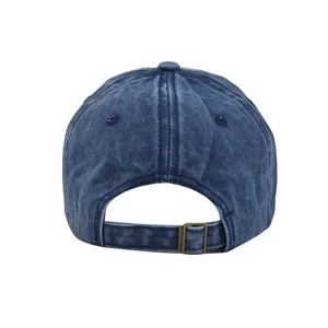 Detail of adjustable vintage bronze buckle on navy washed cotton baseball cap