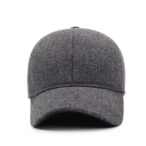 Dark grey winter baseball cap with thick wool blend fabric and ear protection