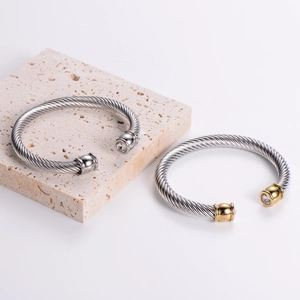 Minimalist stainless steel twisted cable cuff bracelet with zircon inlays on stone base