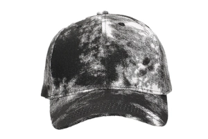 Detailed close-up of a tie-dye baseball cap featuring black and white canvas patterns