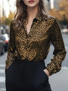 Detail of a leopard print long sleeve shirt featuring satin finish and button-down front