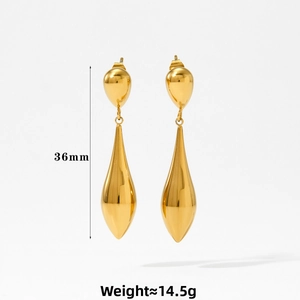 Detail shot of golden teardrop earrings showing 36mm length and 14.5g weight info