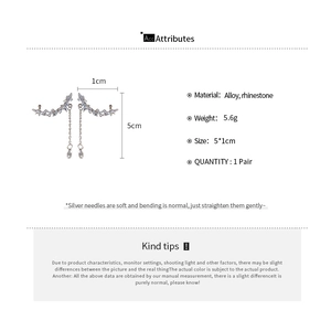 Detail view of rhinestone leaf ear cuff with teardrop tassel showing size and weight specs