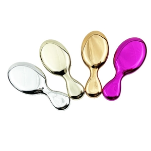 Set of four colorful electroplated massage hair brushes for girls with metallic finish