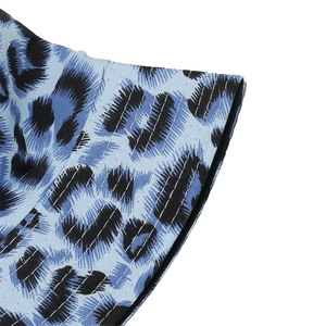 Close-up of blue leopard print bucket hat showing fine stitching and fabric texture