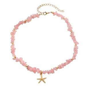 Boho layered necklace with pink quartz stones and a gold starfish pendant charm