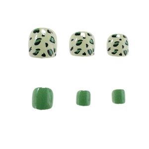 Short green press-on toenails with leopard pattern and matte finish for summer style