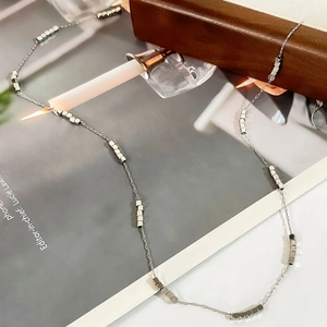 Fashionable titanium steel necklace with small silver cubes on high-quality thin chain