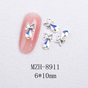 Detail of silver butterfly nail art charms with pear-shaped AB rhinestones and size 6x10mm