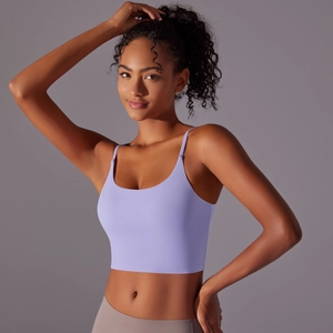 Detail of light purple yoga vest with thin straps and U-neck showing soft matte fabric