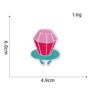 Cute candy ring cartoon embroidered patch with pink and cyan details on white background