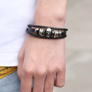 Men's retro leather bracelet with woven layers, skull ornament and metallic beads
