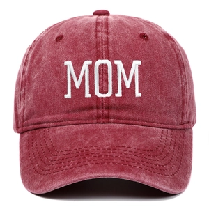 Detail of MOM embroidery on wine red washed cotton vintage style baseball cap