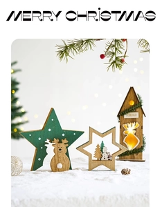 Close-up of wooden Christmas tabletop ornaments with reindeer, star, and glowing LED cabin