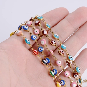 Classic colorful Evil Eye bracelet with gold chain and multi-color enamel eye charms