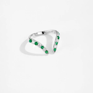 Macro shot of S925 silver ring featuring V-shape design with green and clear gemstones