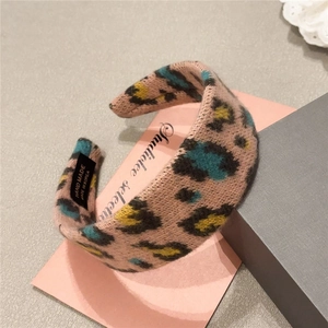Detail of pink leopard print plush headband with handmade in Korea inner label