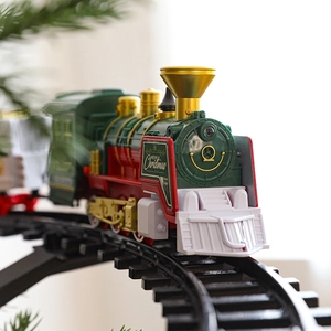 Classic electric Christmas steam train set with red and green track for tree decoration