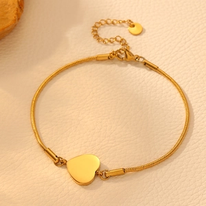 Bracelet chaîne serpent en acier inoxydable doré avec pendentif cœur poli pour femme