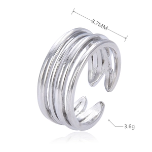 Detail showing the 8.7mm width and 3.6g weight of this silver multi-layer open ring