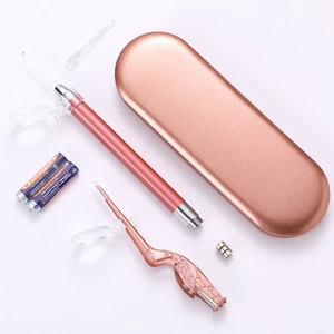 Rose gold light-up earwax removal set with tweezers and accessories in a storage case