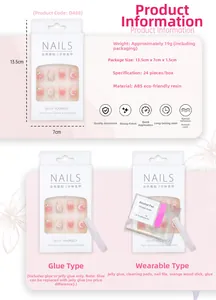 Gros plan d'ongles roses dégradés avec accents de diamants et papillons brillants
