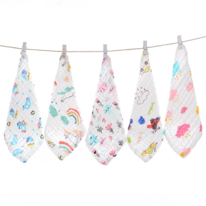 Detail of five multi-pattern cotton gauze baby washcloths with cute hanging designs