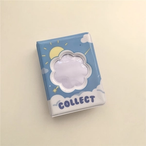 Blue mini photo album featuring a cloud-shaped window and cute sky pattern cover