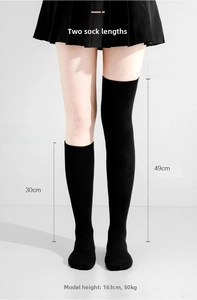 Detail of black knit socks in two lengths: 30cm calf high and 49cm over-the-knee