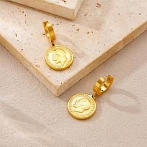 Retro gold plated stainless steel coin earrings with embossed portrait on stone background