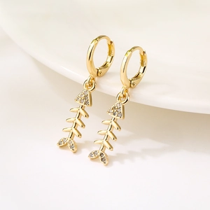 18K gold plated fishbone earrings with micro-set zircons on a clean white surface
