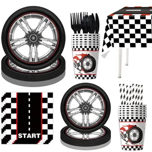 Racing car party supplies set with tire-style plates, checkered cups, and napkins