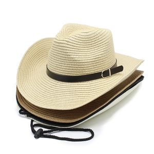 Vertical stack of straw cowboy hats in beige, brown, and black with metallic buckle details