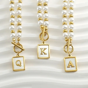 18K gold plated stainless steel pearl necklace with shell letter pendants Q, K, and A