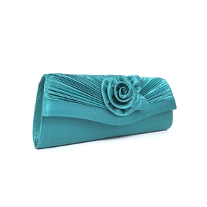 Detail of the lake blue satin evening clutch featuring 3D rose and pleated texture