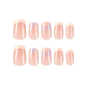 Short French press-on nails with yellow-purple floral design on nude pink base