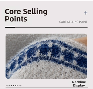 Detailed macro view of the fluffy blue and white floral jacquard neckline on a knitted shawl