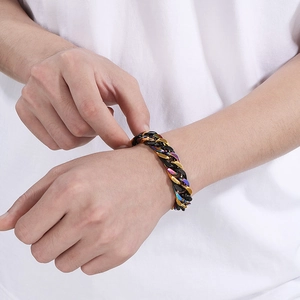 Close-up of colorful gradient Cuban chain bracelet in stainless steel on male model wrist