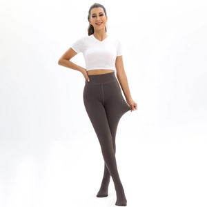 Detail of high elasticity material being stretched on thick thermal leggings