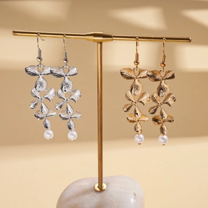 Elegant metal flower petal earrings with white pearl pendants in gold and silver finish