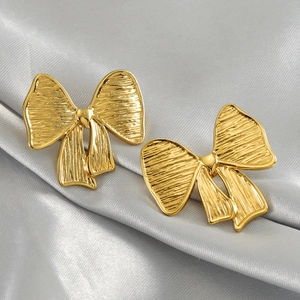 Vintage Titanstahl Schleifenohrringe Mode 18k Gold Textur Steckerohrringe Für Frauen Geometrisch Heißer Verkauf Ohrschmuck