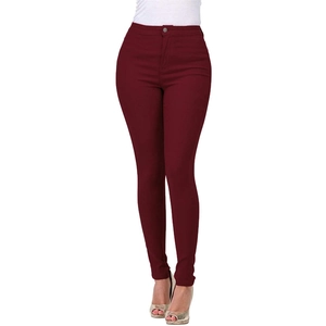 Detail of high waisted stretch skinny jeans in wine red featuring button and zip fly closure
