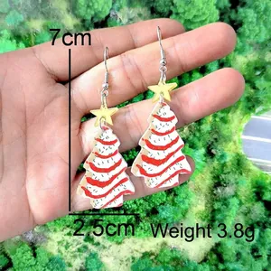 Detail view of acrylic Christmas tree earrings with size dimensions 7cm by 2.5cm