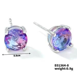 Detail view of 0.6cm gradient purple and blue crystal studs with four-prong silver setting
