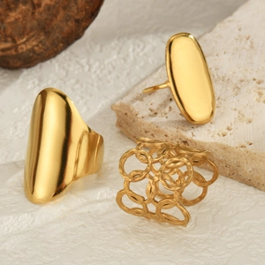 Polished 14K gold plated stainless steel rings featuring malachite in a minimalist vintage style