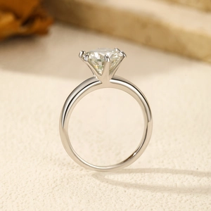 Elegant S925 sterling silver ring featuring a 2-carat round moissanite in a 4-prong setting
