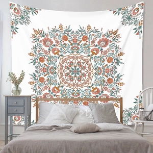 Bohemian floral mandala wall tapestry in orange and teal for bedroom wall decor