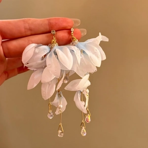 Elegant fabric flower earrings with blue petals pearls and long tassels detail