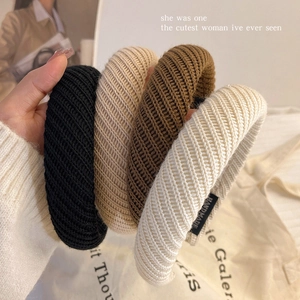 Handmade knitted wide headbands in neutral colors with premium textured wool material