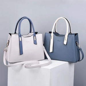 Chic two-tone faux leather handbags for women in beige and blue with shoulder straps